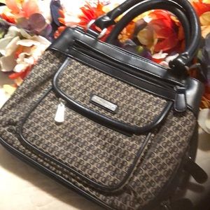 Cute satchel bag with four separate compartments.